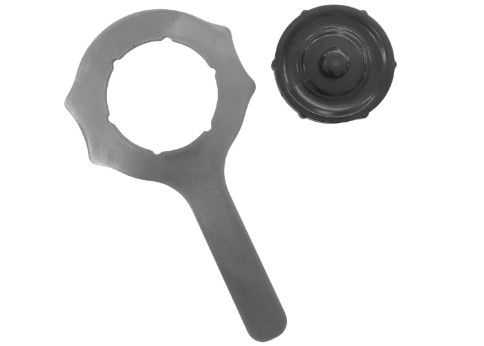 Spændenøgle til at spænde/løsne sort skruelåg til Airtrack Pro og til at montere reparationsventil.