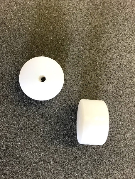 Afstandsklods til montering på væggen for at holde sidespejlet i rette position.