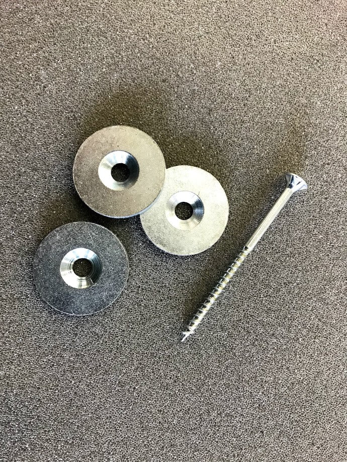 Skive med hul til afstandsklods. 